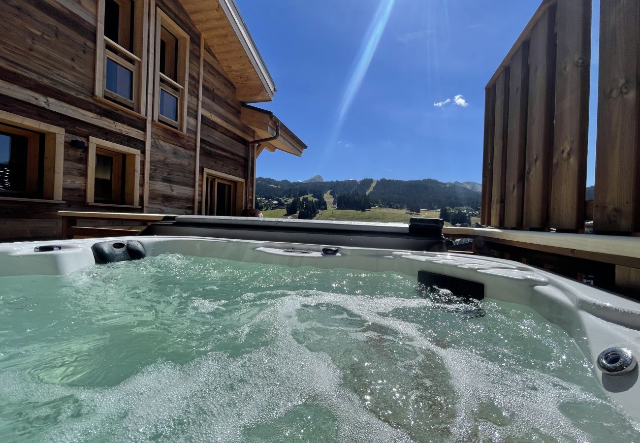 Appartement à Les Gets - Duplex avec jacuzzi, vue dégagée et proche centre